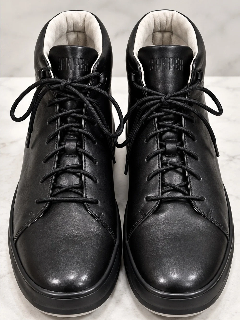 Camper Chasis men’s high-top sneakers / ankle boots in classic black leather.